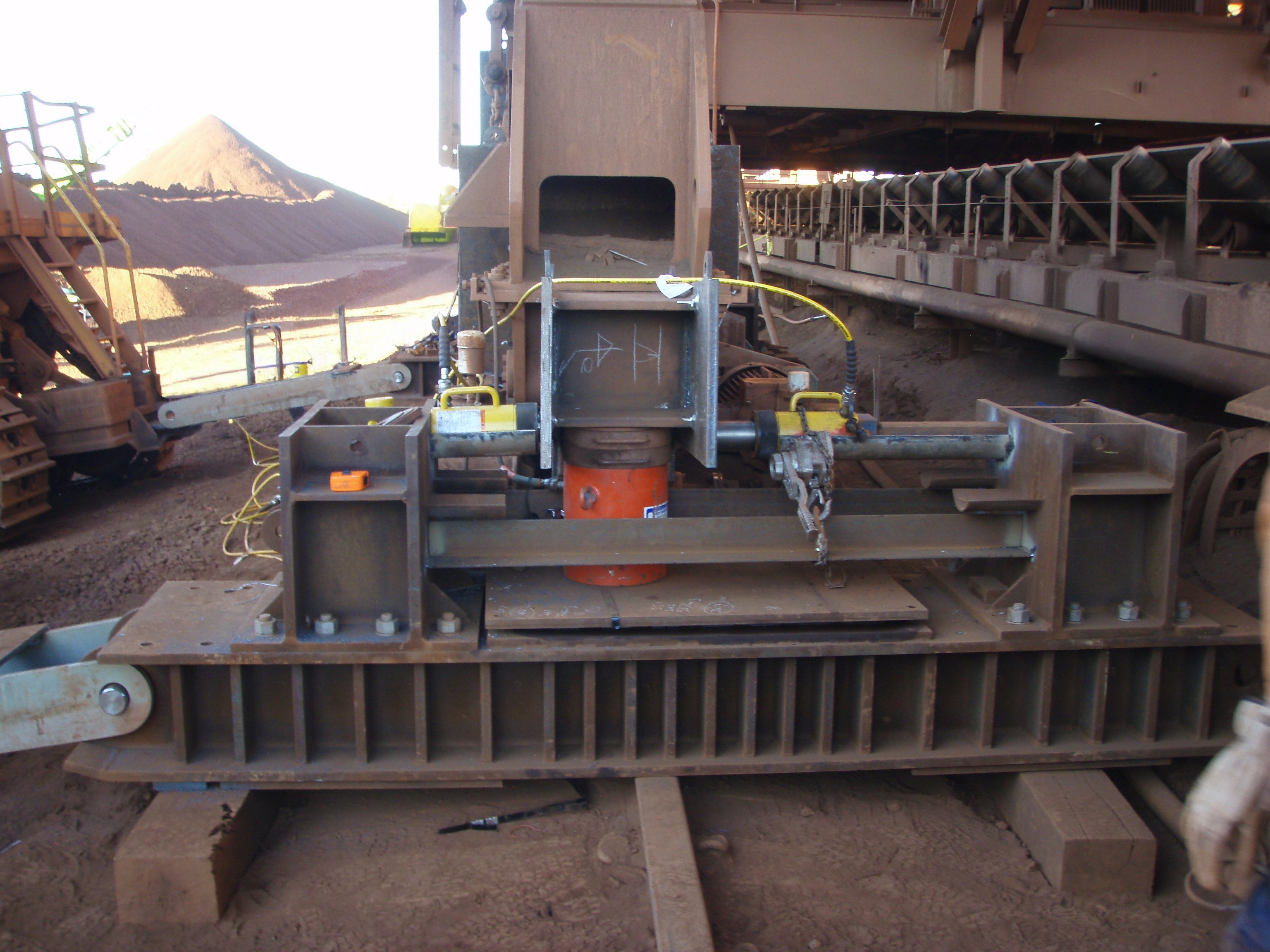 Emergency derailment recovery works on a balanced machine, including structural engineering assessment and safe return to service.
